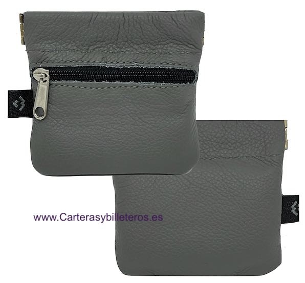 ECONOMIC LEATHER PURSE WITH STRAP CLOSURE AND ZIPPER POCKET 