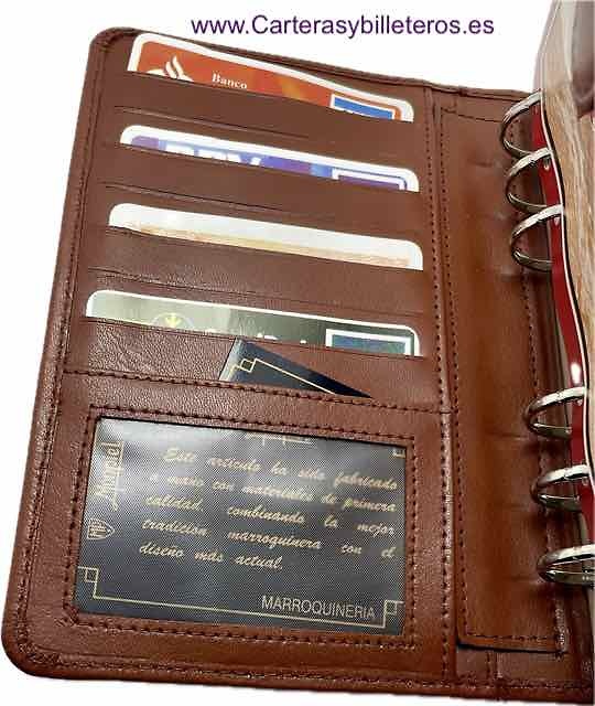 MEDIUM SIZED LEATHER-BOUND HANDHELD PLANNER WITH SPARE RINGS AND CARD HOLDER 