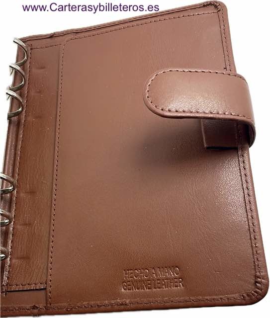 MEDIUM SIZED LEATHER-BOUND HANDHELD PLANNER WITH SPARE RINGS AND CARD HOLDER 