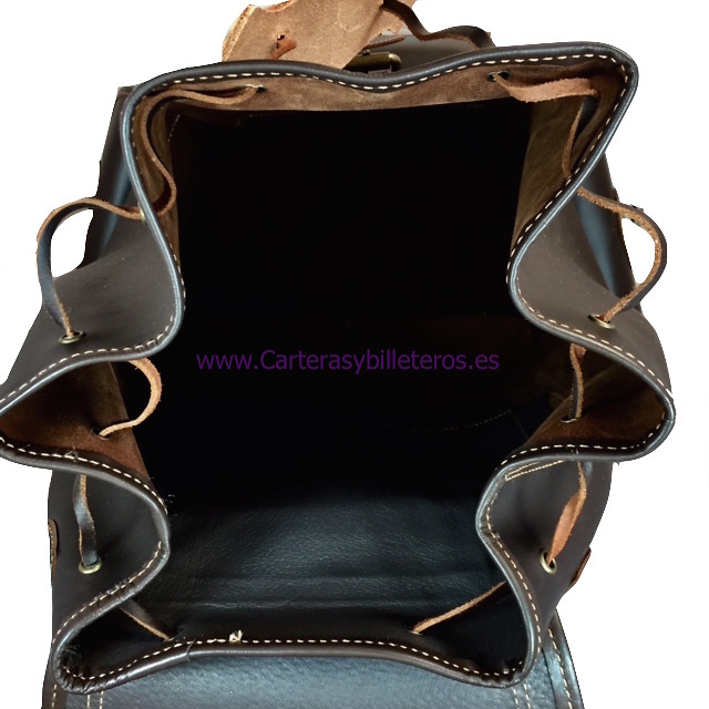 VERY LARGE LEATHER BACKPACK WITH 4 POCKETS MADE IN SPAIN OF ARTISANAL SHAPE AND CLOSURE BELTS IN POCKETS 